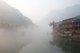China: Early morning on Fenghuang's misty Tuo River, Fenghuang, Hunan Province